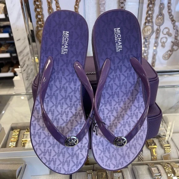 Michael Kors BEDFORD FLIP FLOP
PVC/OMBRE MK SIG
Platform Sandals 
Dark Purple - Picture 16 of 16